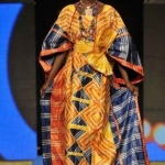 A model presents an outfit by Tuareg designer Alphadi during the 10th Dakar Fashion Week